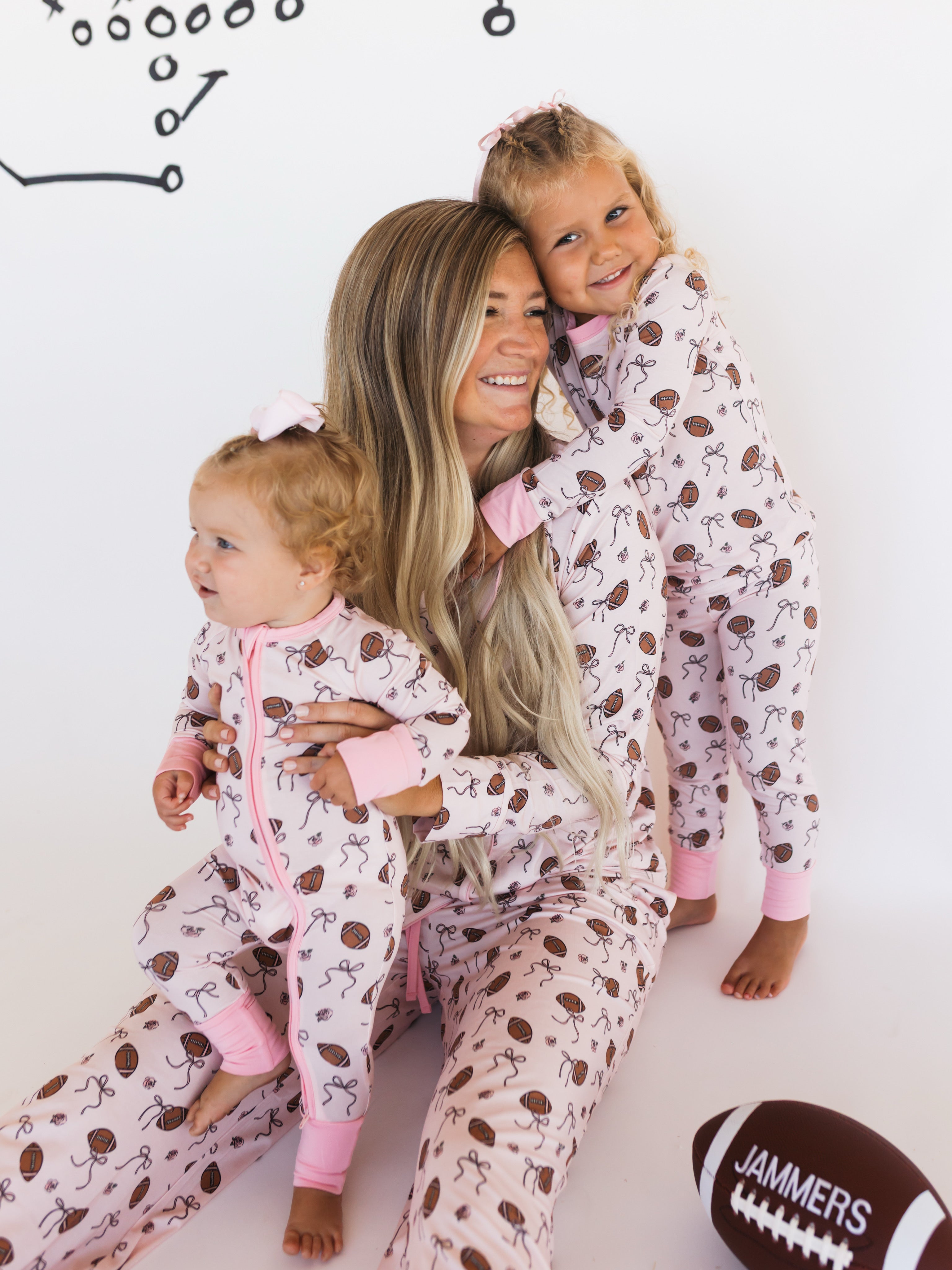 Blush Football Zipper Romper