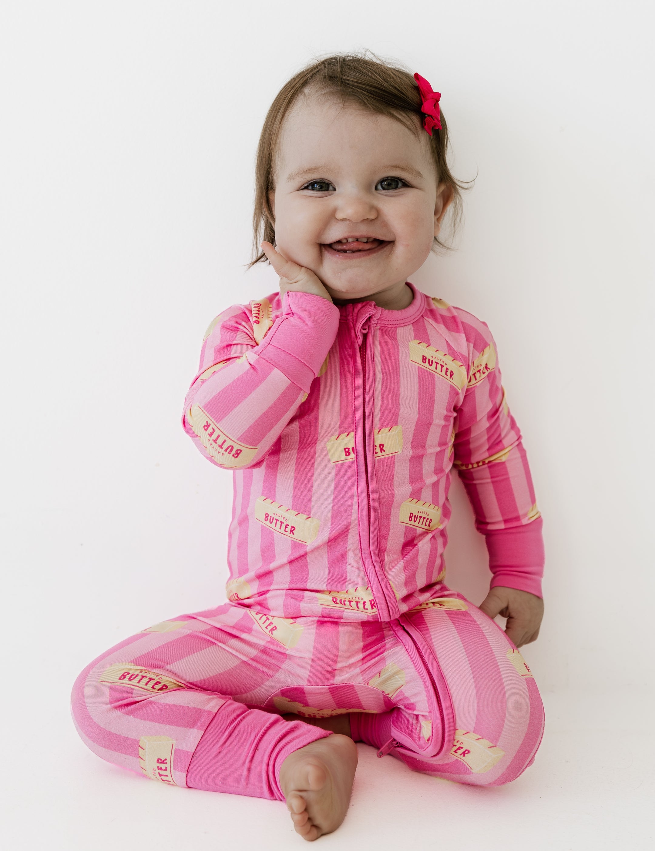 PDP-PinkStripeButter-Zipper-1_2x_5feb922c-1b5c-4754-8111-d18694004619.jpg