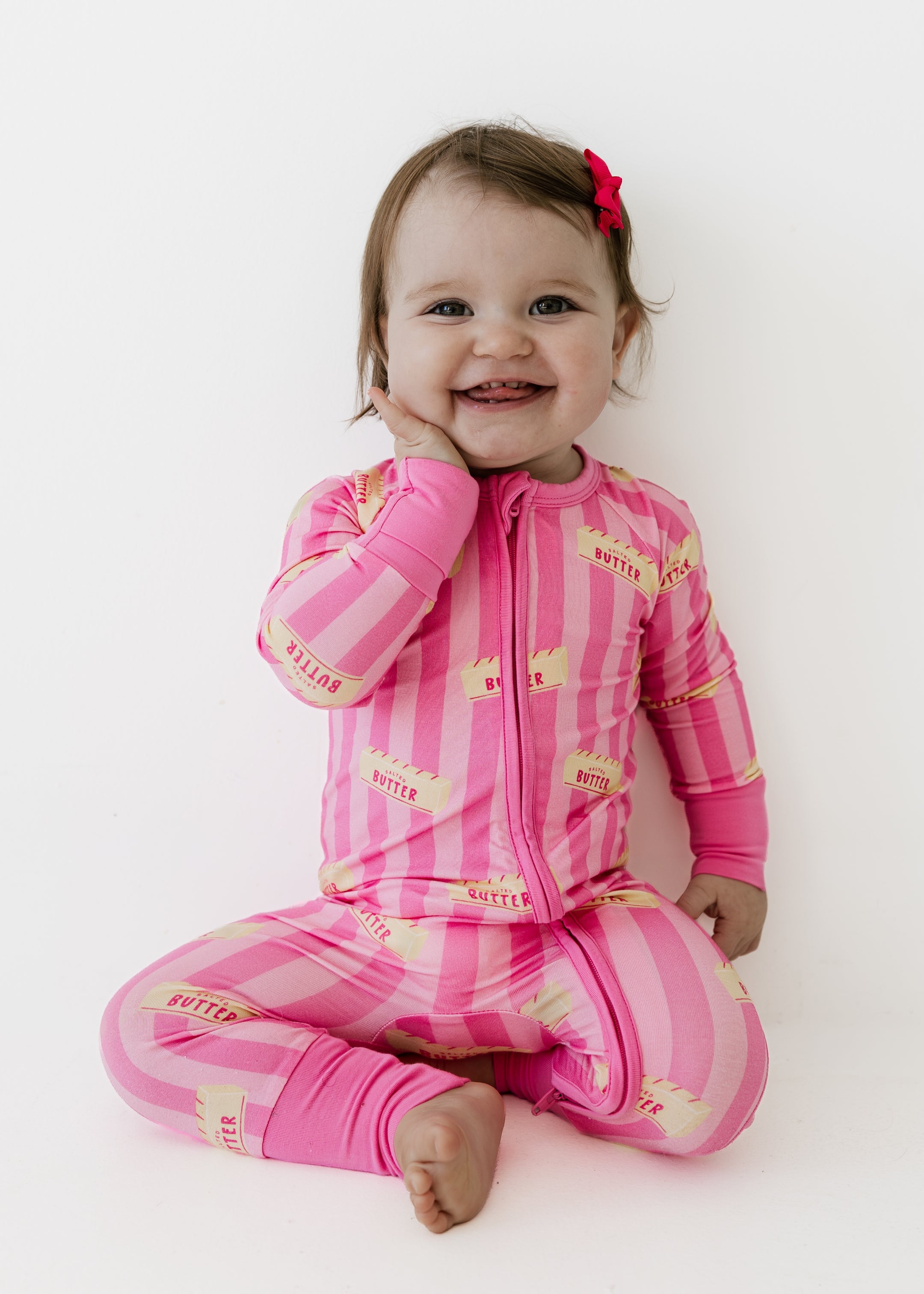 PDP-PinkStripeButter-Zipper-1_2x_5feb922c-1b5c-4754-8111-d18694004619.jpg