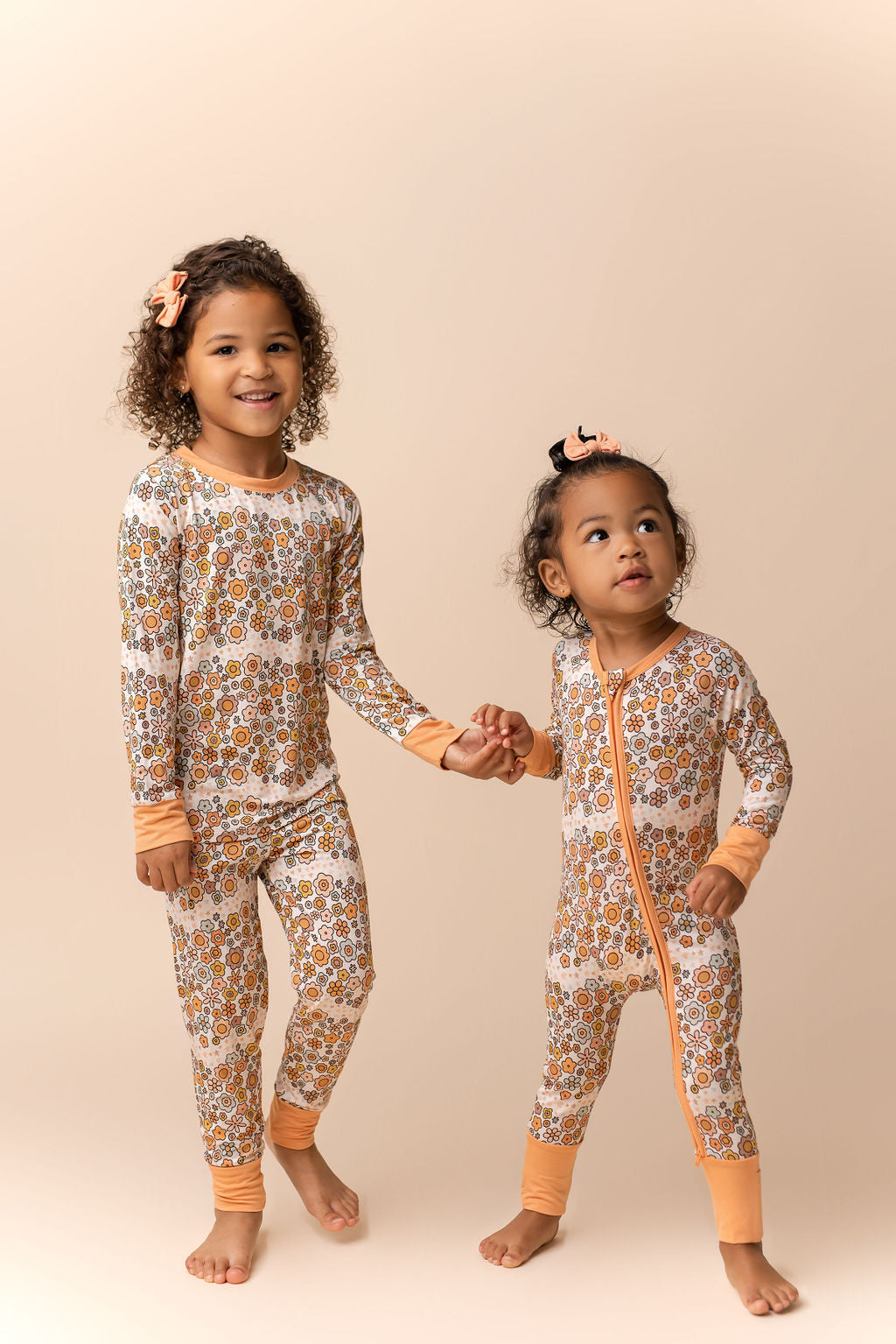 Oopsie Daisy Zipper Romper.