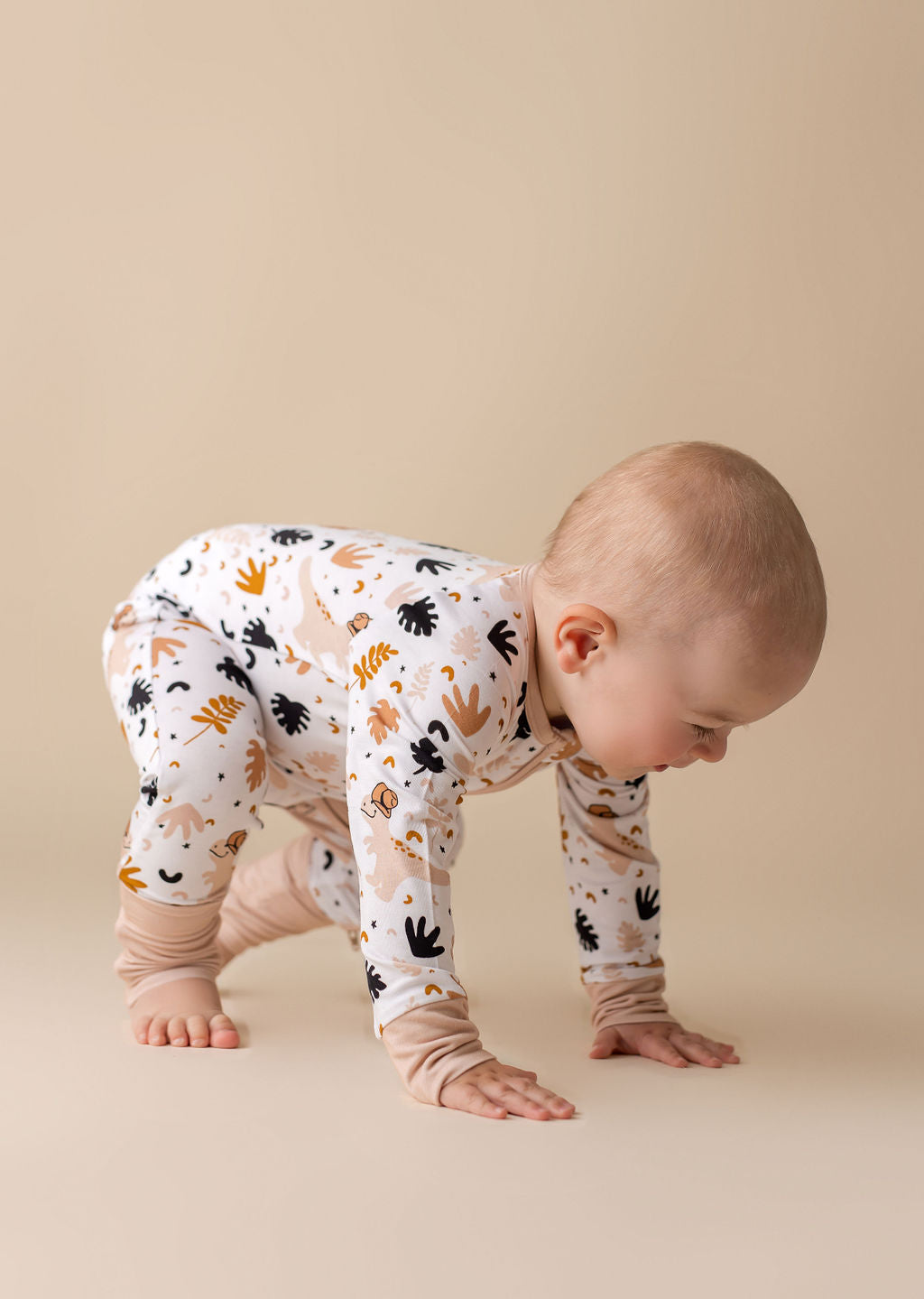 Dino Dude Zipper Romper.